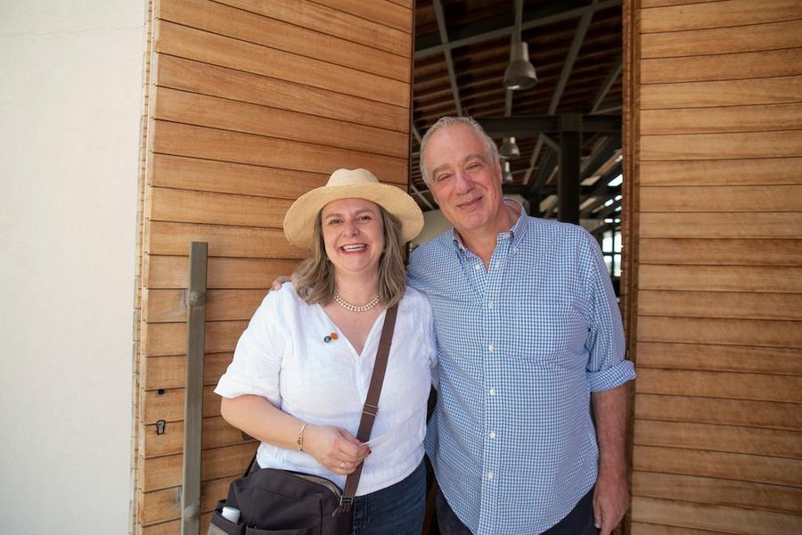 a couple smiling at the camera